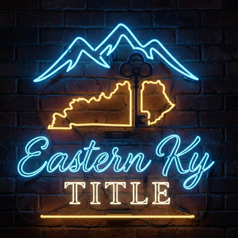 A light gray hat with “Eastern Ky Title” logo is displayed in front of a large American flag.